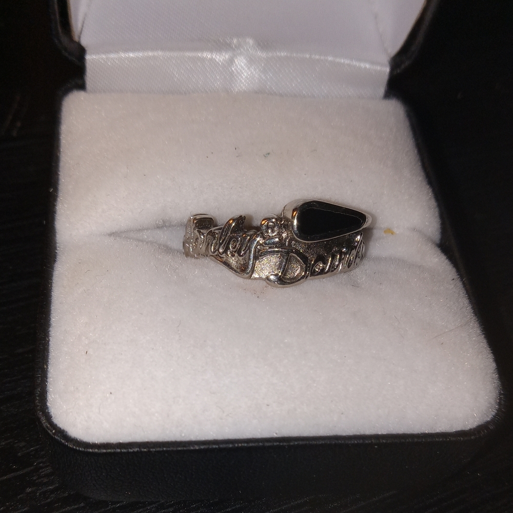 Woman's vintage 10 karat white gold, Harley Davidson wedding band.